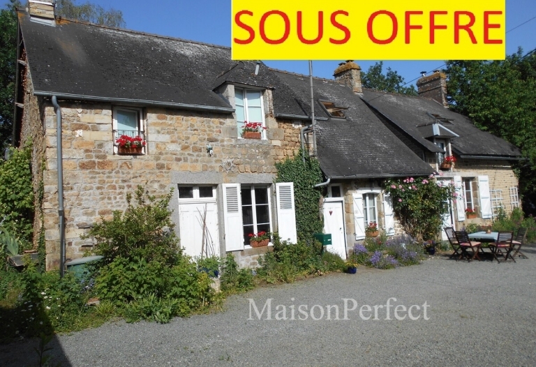 Spacieuse maison avec potentiel dans un &eacute;crin de verdure